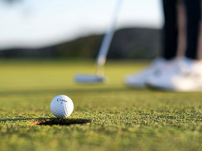 Golf Ball near hole